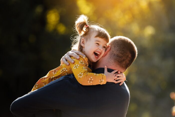 Father and daughter hug