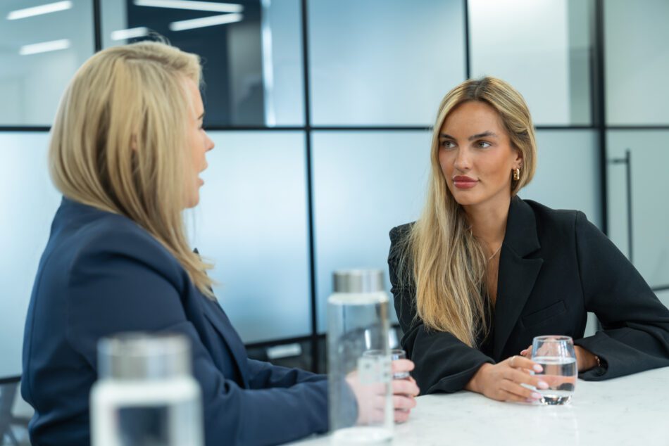 Two employees in discussion