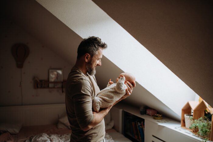 What is Paternity Fraud and how is it treated in the Family Court? 16 Father,Holding,His,Newborn,Baby.,Unconditional,Paternal,Love,,Father's,Day