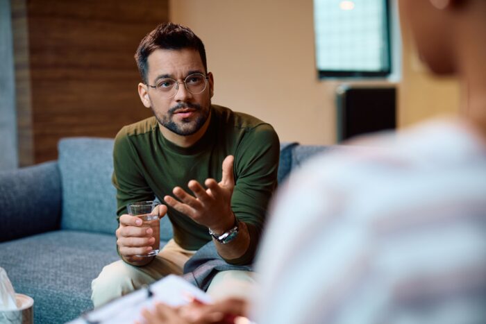 Young,Man,Talking,About,His,Issues,With,Psychotherapist,In,The