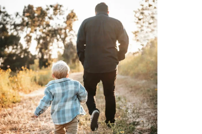 Man and child walking