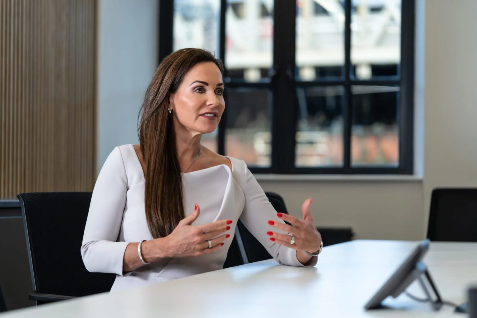 Amanda McAlister, Managing Partner at McAlister Family Law, discussing client care in the Knutsford family law office.